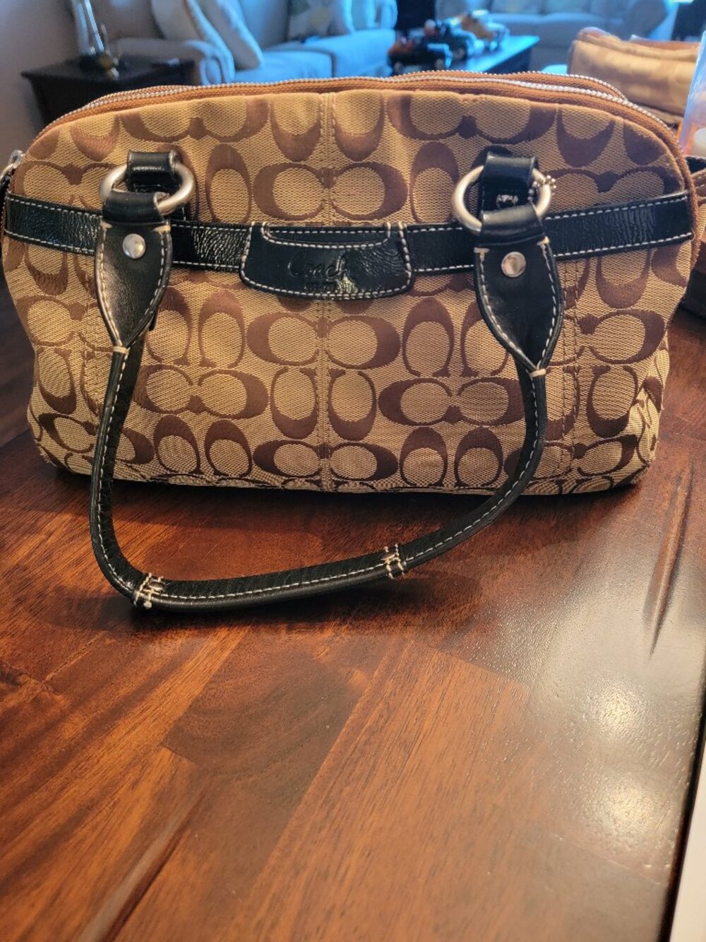 Coach  Brown shoulder bag logo pattern black leather trim double handles zip